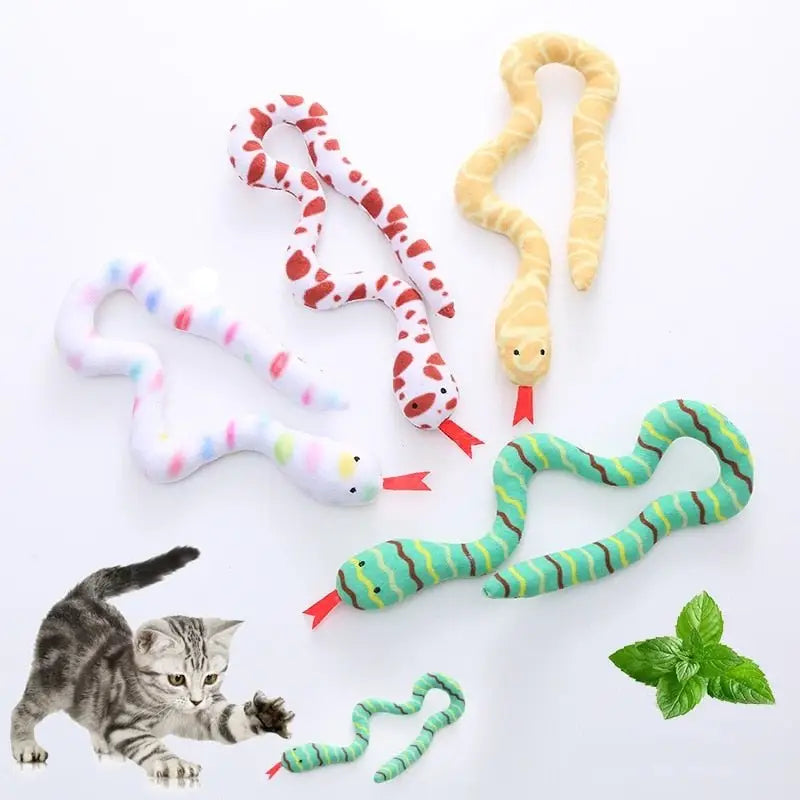 Variété de jouets sur table : jouet serpent cadeau idéal pour animaux de compagnie