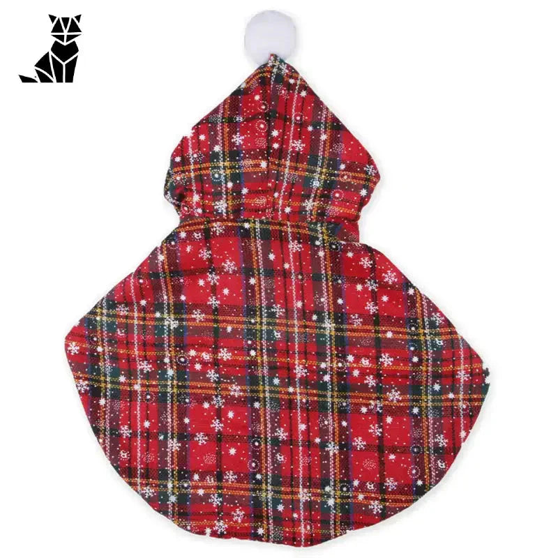 Manteau de chien à carreaux rouges avec des flocons de neige dans le costume de chat de Noël, photo de confort et de sécurité