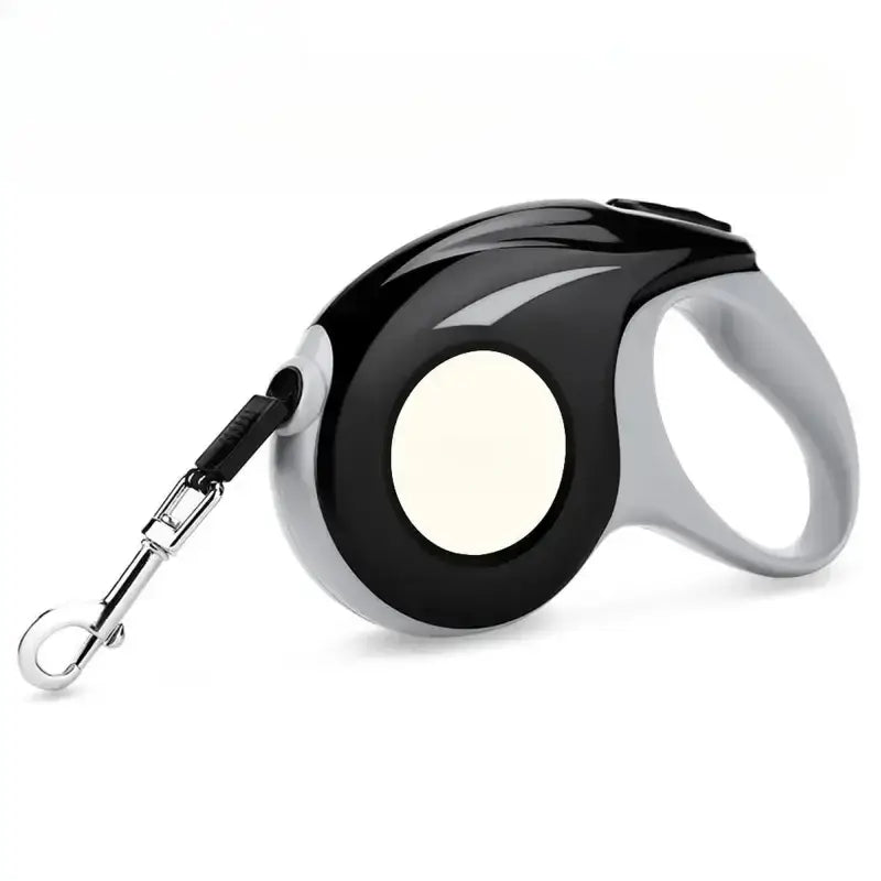 Laisse automatique rétractable noire et blanche avec balle blanche